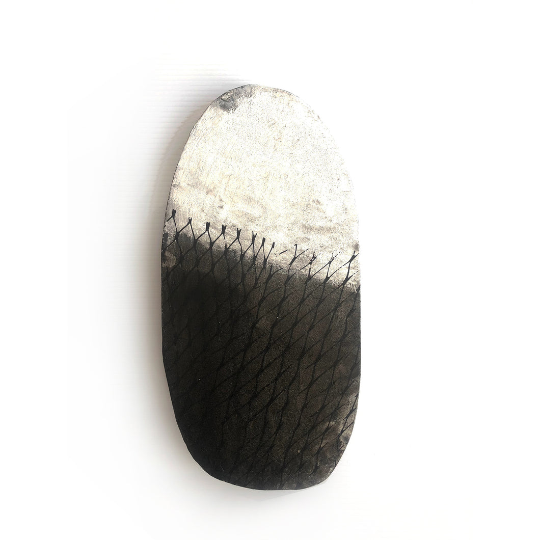 Black in the bag plaster painting